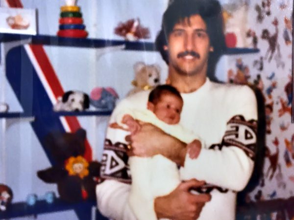 Joe Racich holding his newborn son David, 1982