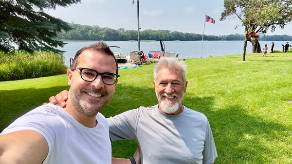Joe and David Racich by a lake, 2024